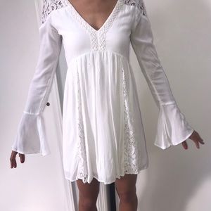 White lace flowey dress.
